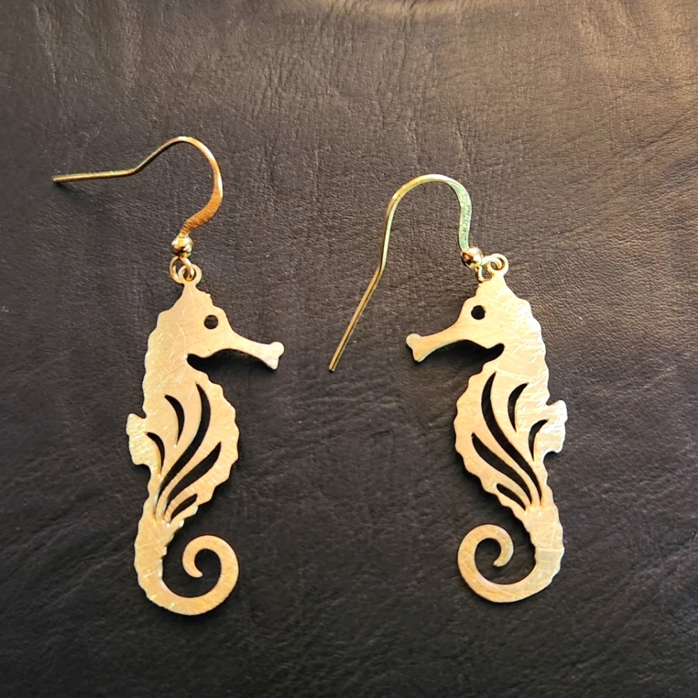 Handcut  goldtone Seahorse dangle pierced earrings.